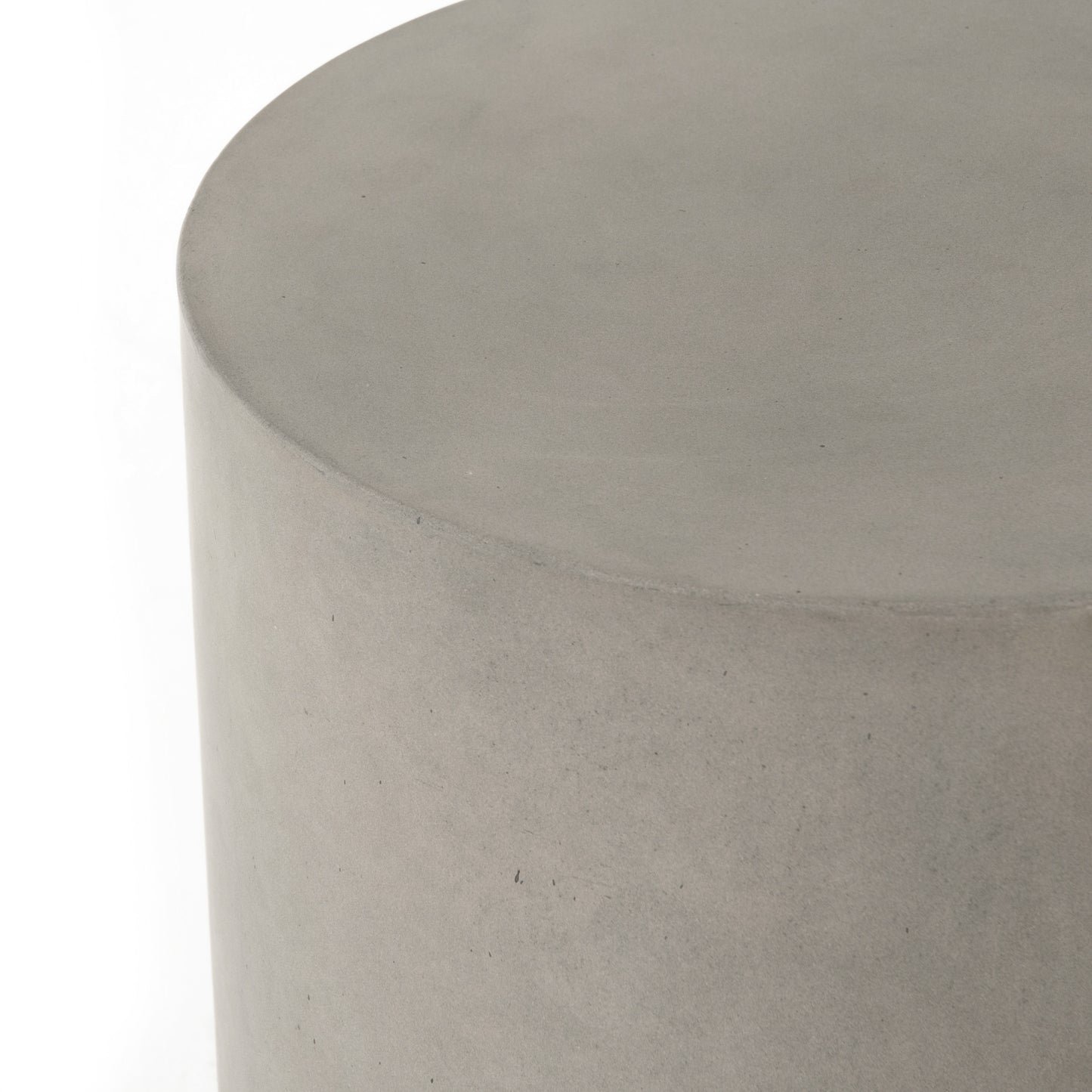 modern grey cylindrical end table with plaster finish