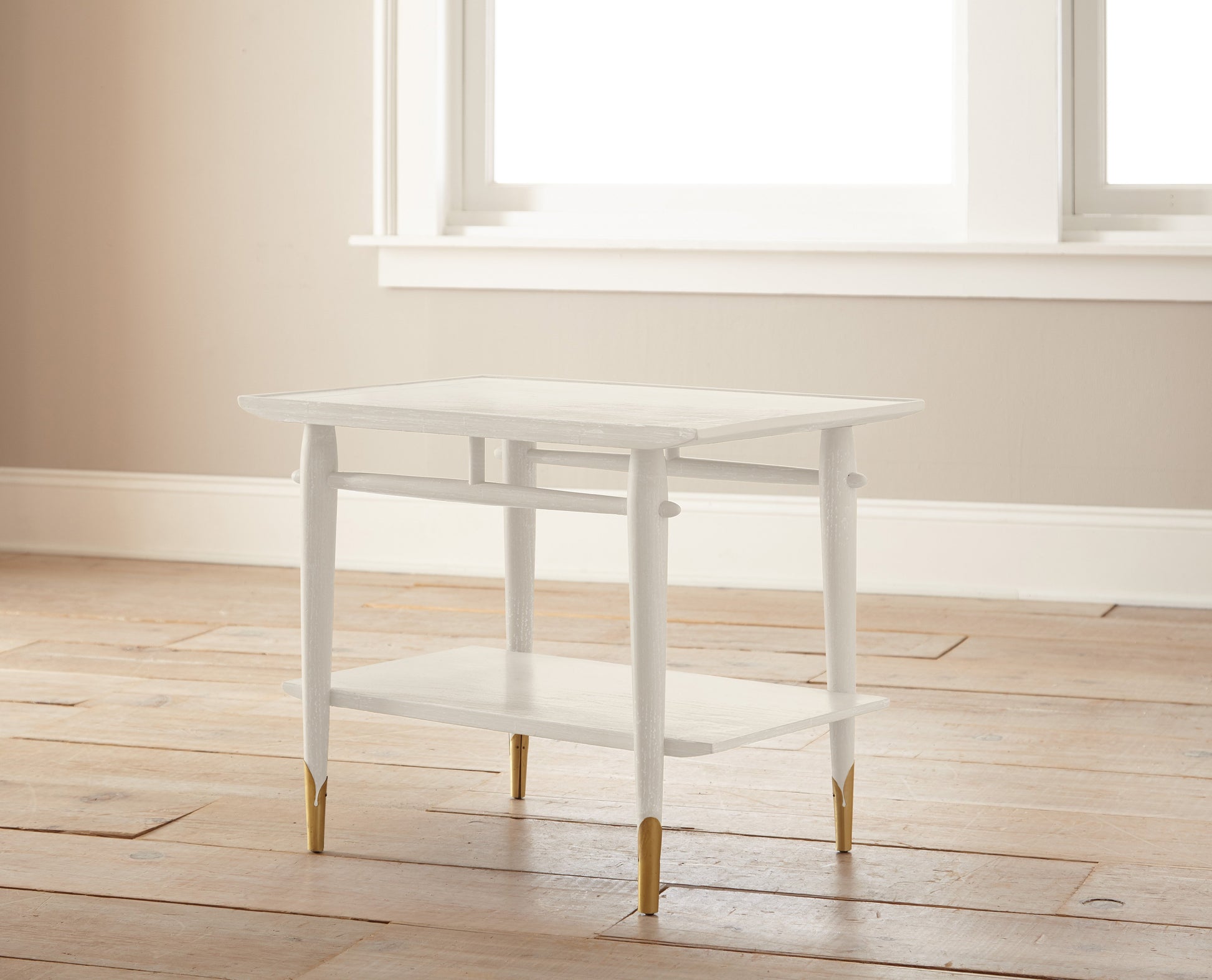 An ivory shade dusted with pink and yellow chalk style paint