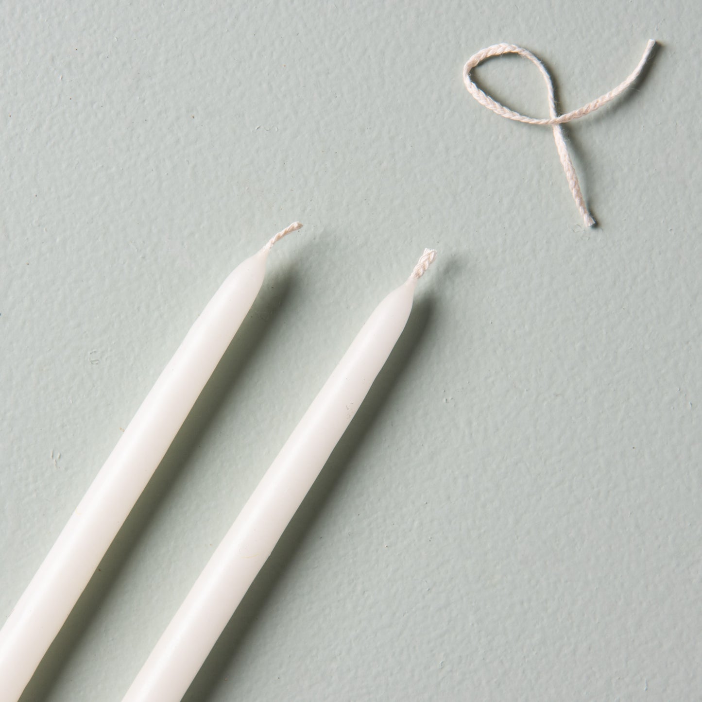10" handmade skinny taper candles in various colors