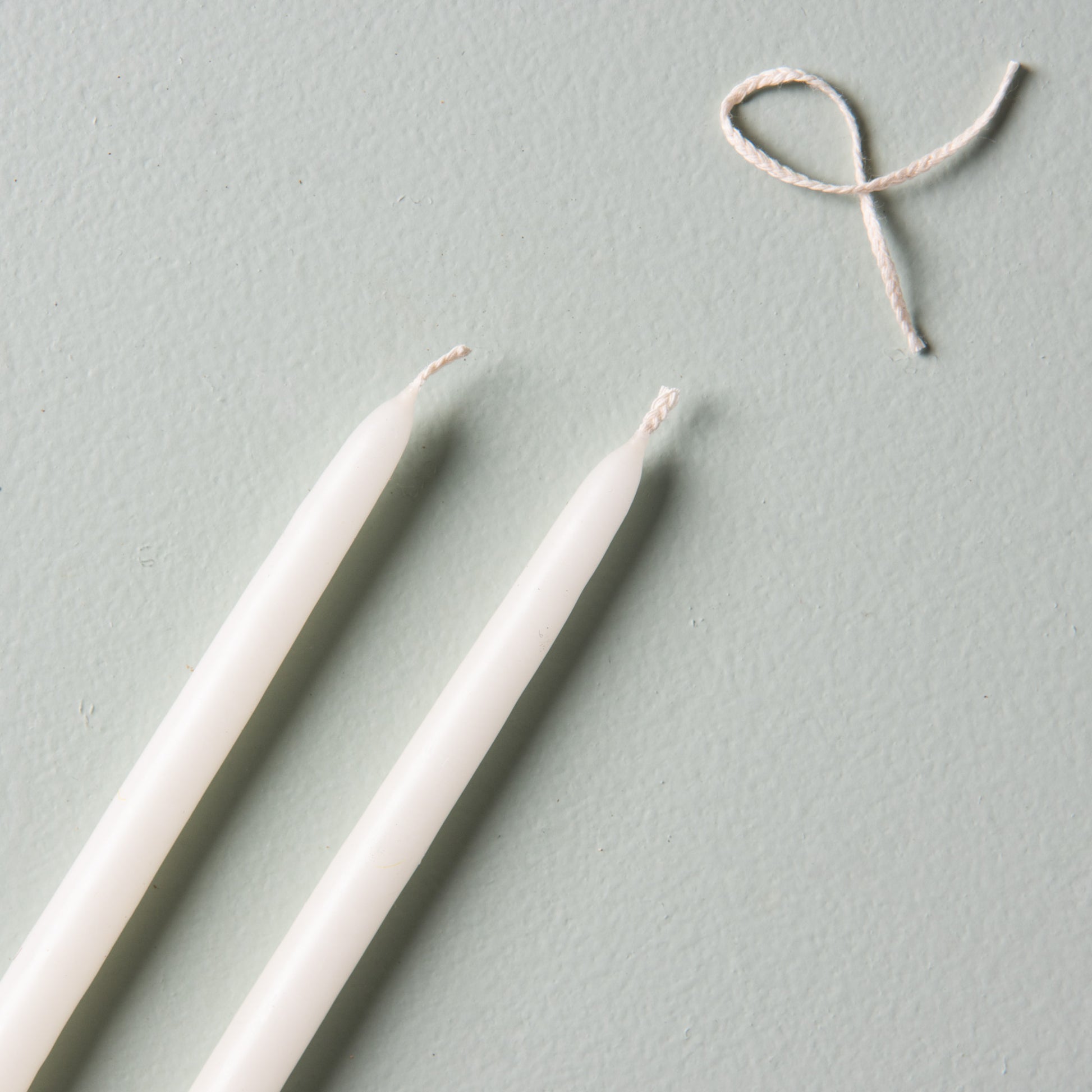 10" handmade skinny taper candles in various colors