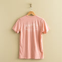 pink-coral t-shirt with "magnolia est 2003" in a cursive script font