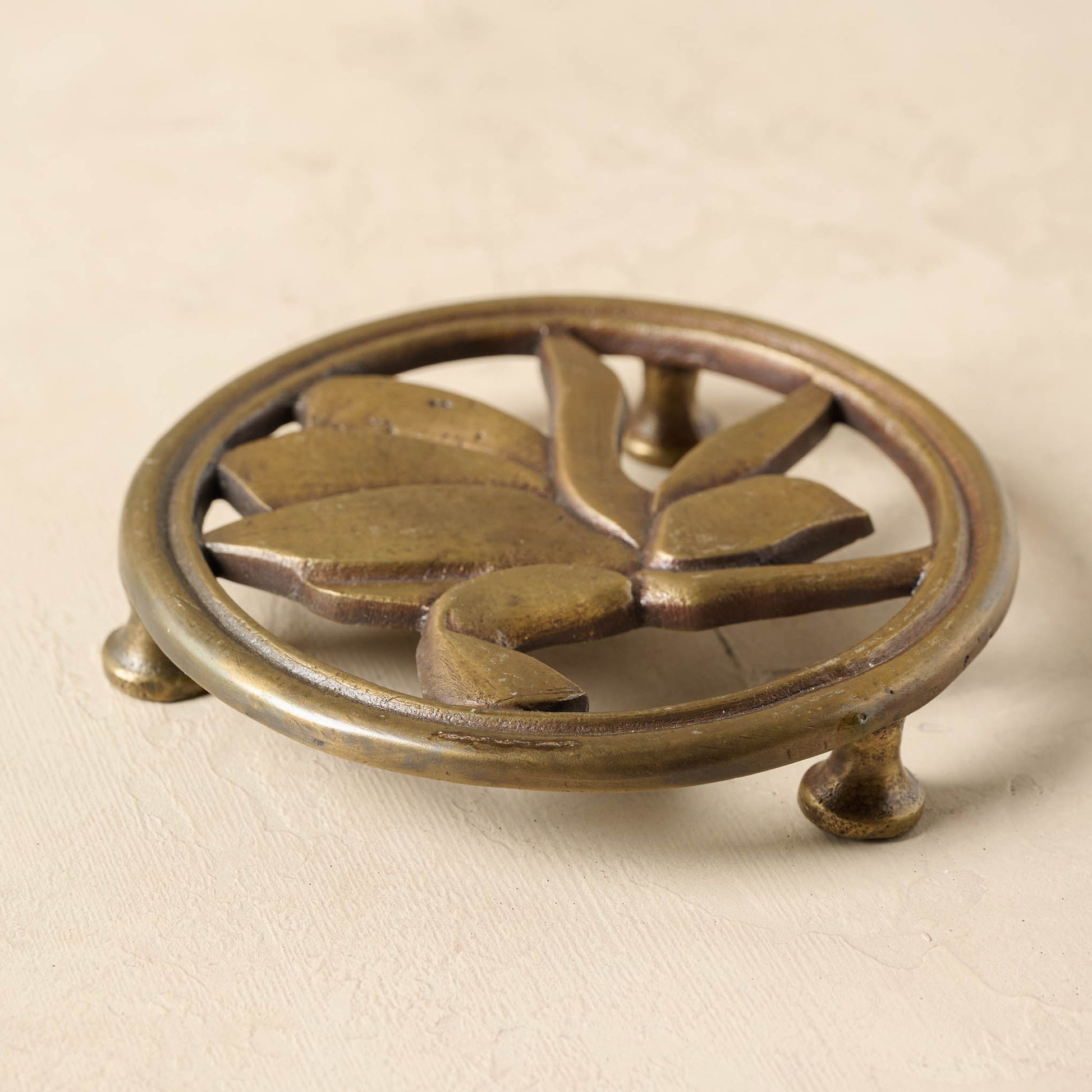 Magnolia Antique Brass Trivet