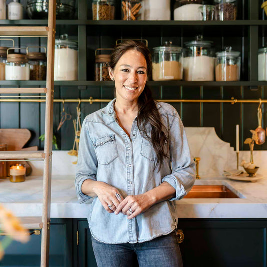 Joanna Gaines smiles in her butler's pantry at the farm—surrounded by kitchen and baking essentials