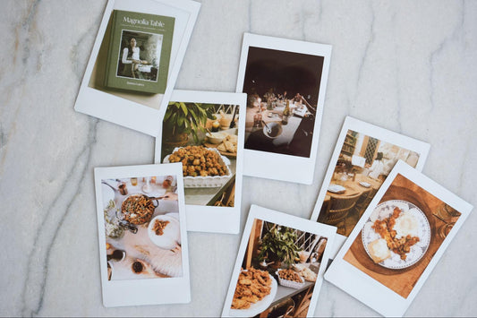 A collection of polaroid images featuring dishes from Magnolia Table, Volume 3 and a dinner gathering.