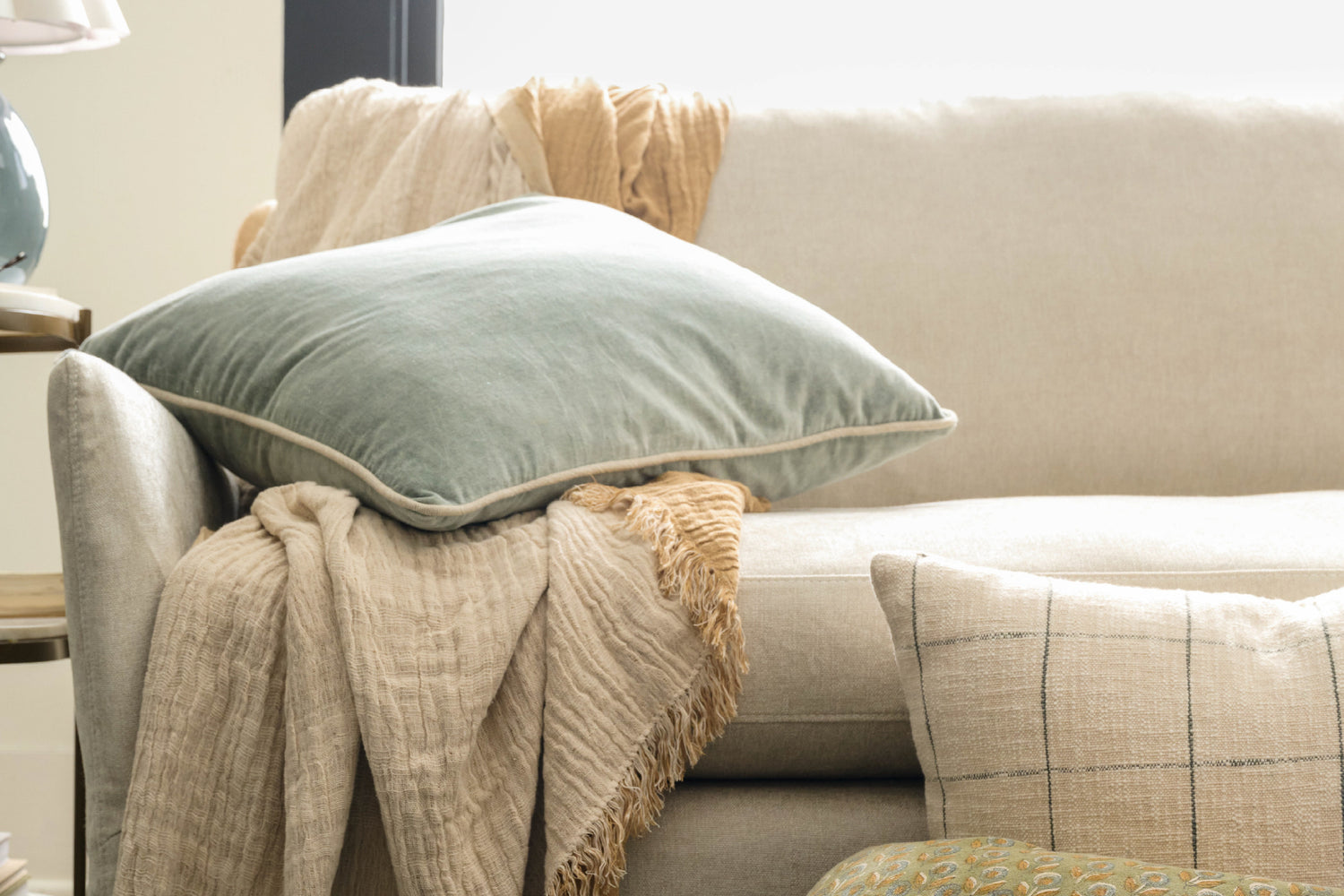 Affordable Accents: Pillows, Accent Chairs, Side Tables, Table Lamps and Throw Blankets