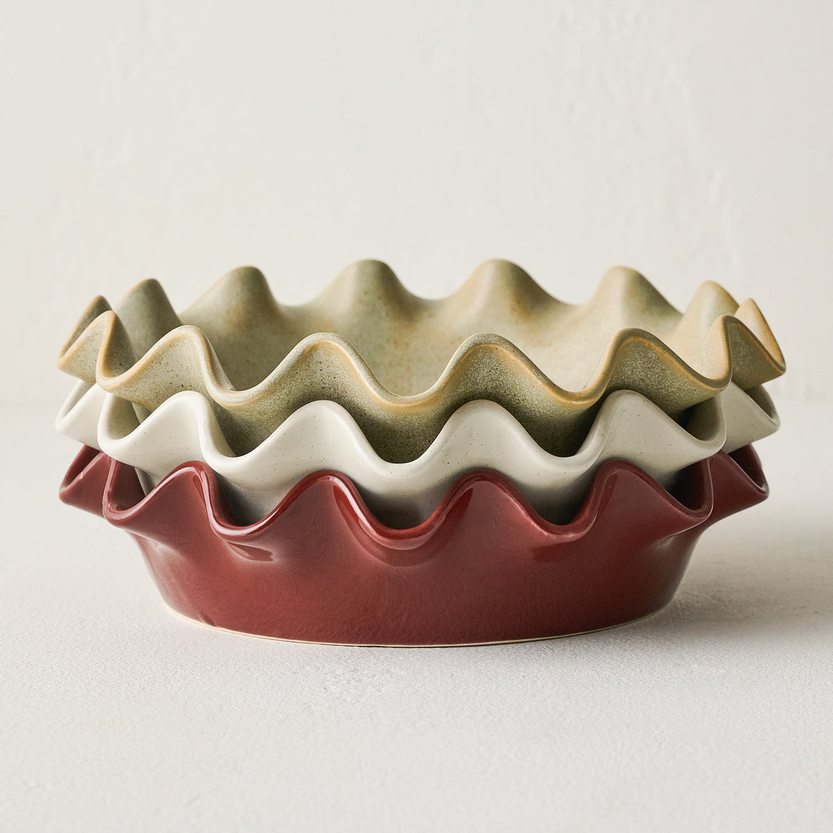 Andorra Pie Dish shown stacked with other pie dishes