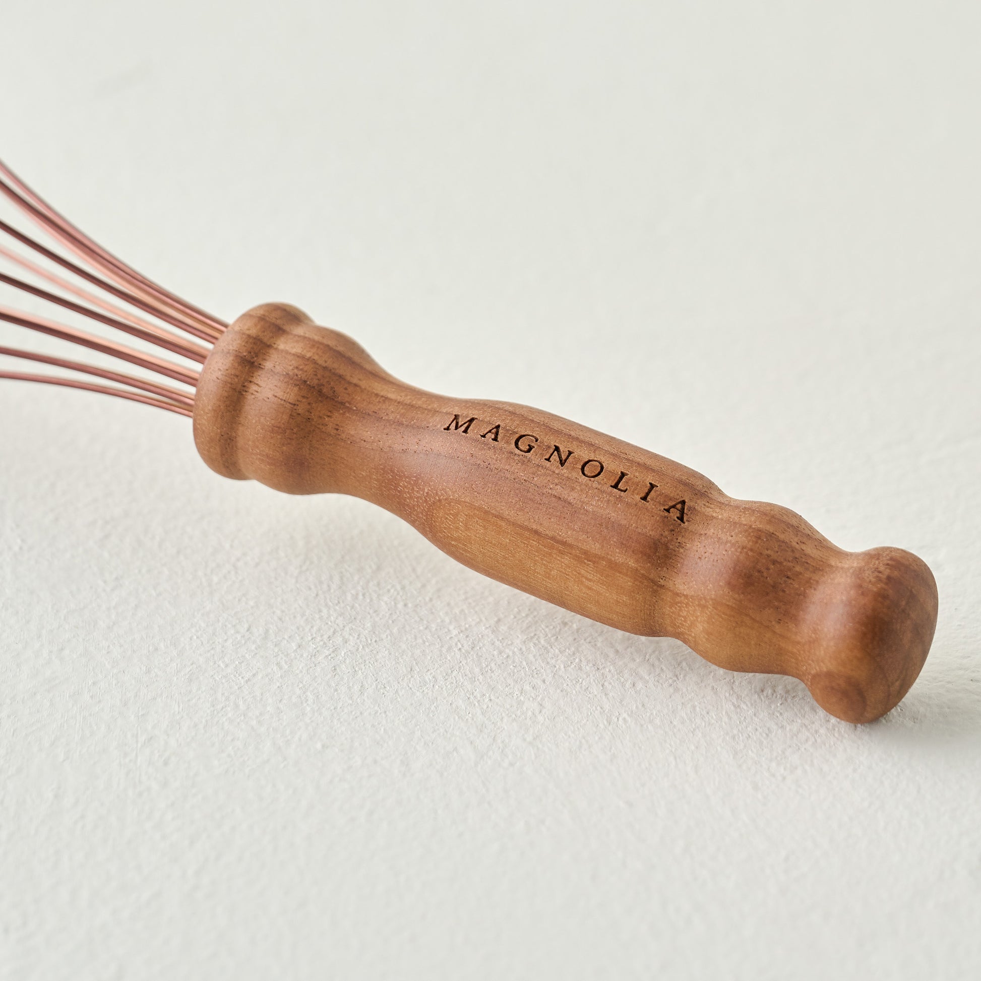 Copper and Walnut Whisk, Magnolia branded handle up close