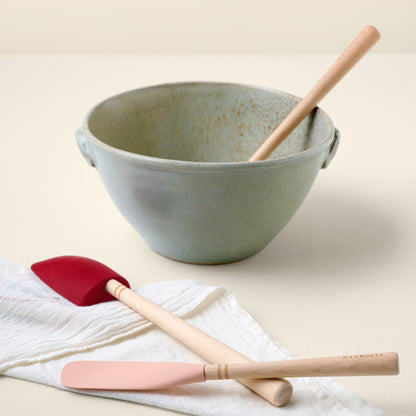 Laurie Spatula Bundle shown with mixing bowl and tea towel