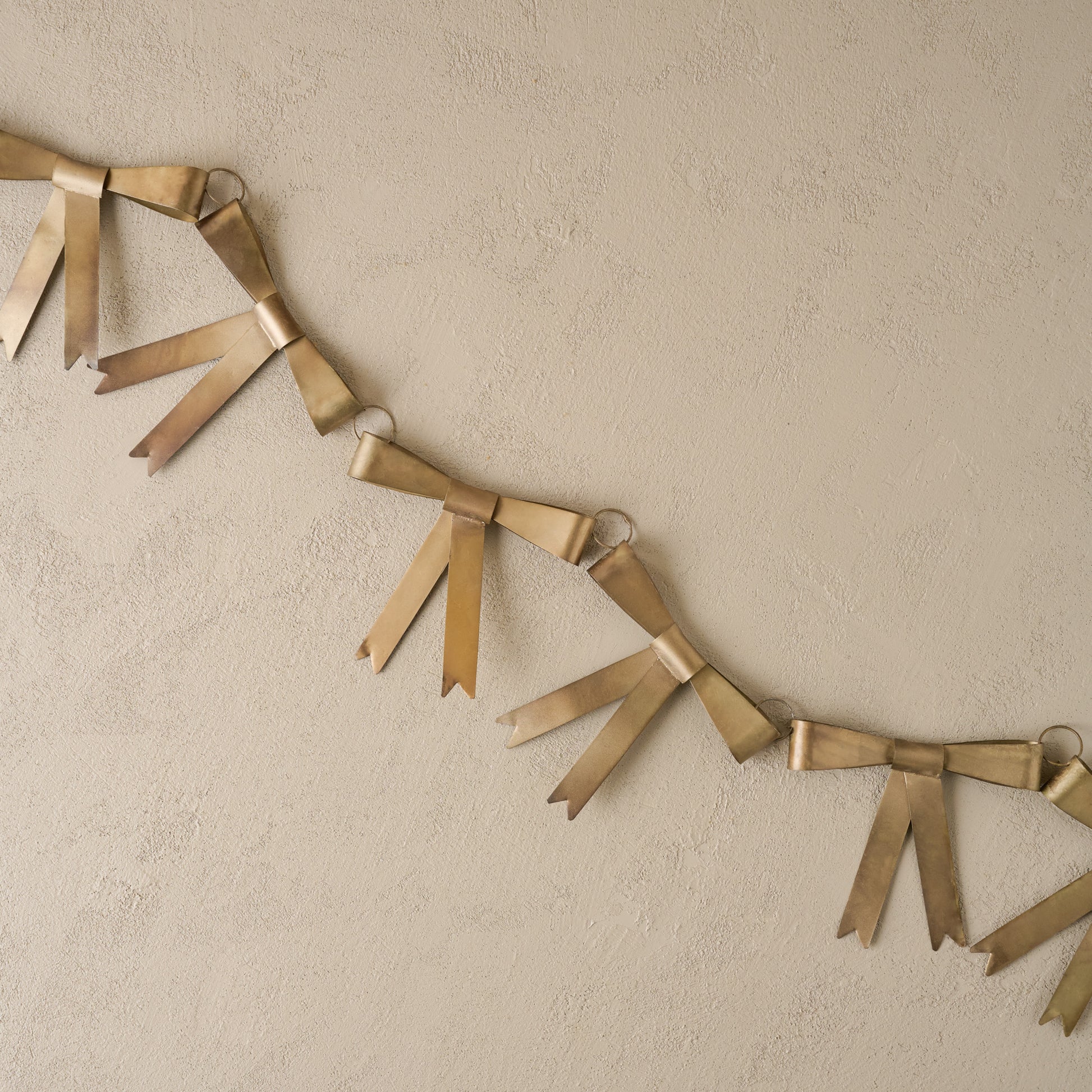 Gloria Brass Bow Garland