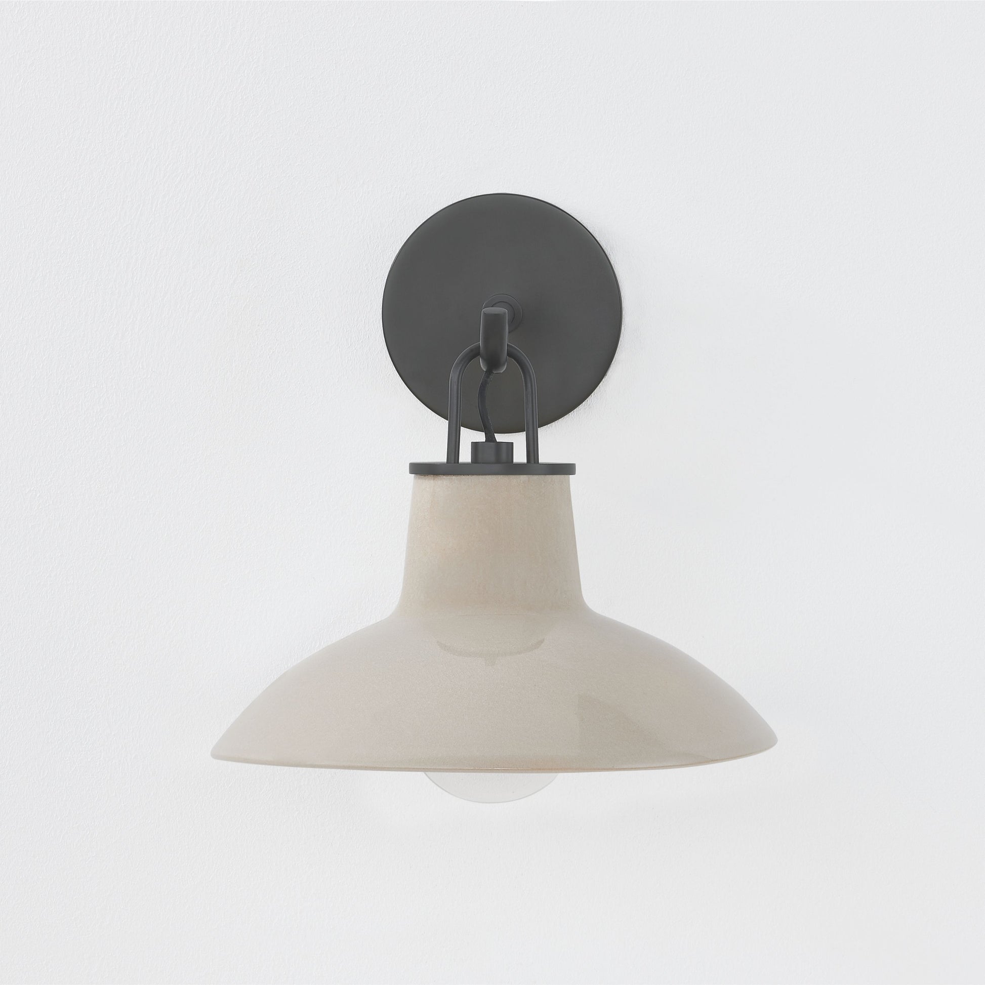 Justine Sconce in color Distressed Black with Ceramic Ivory Crackle front view