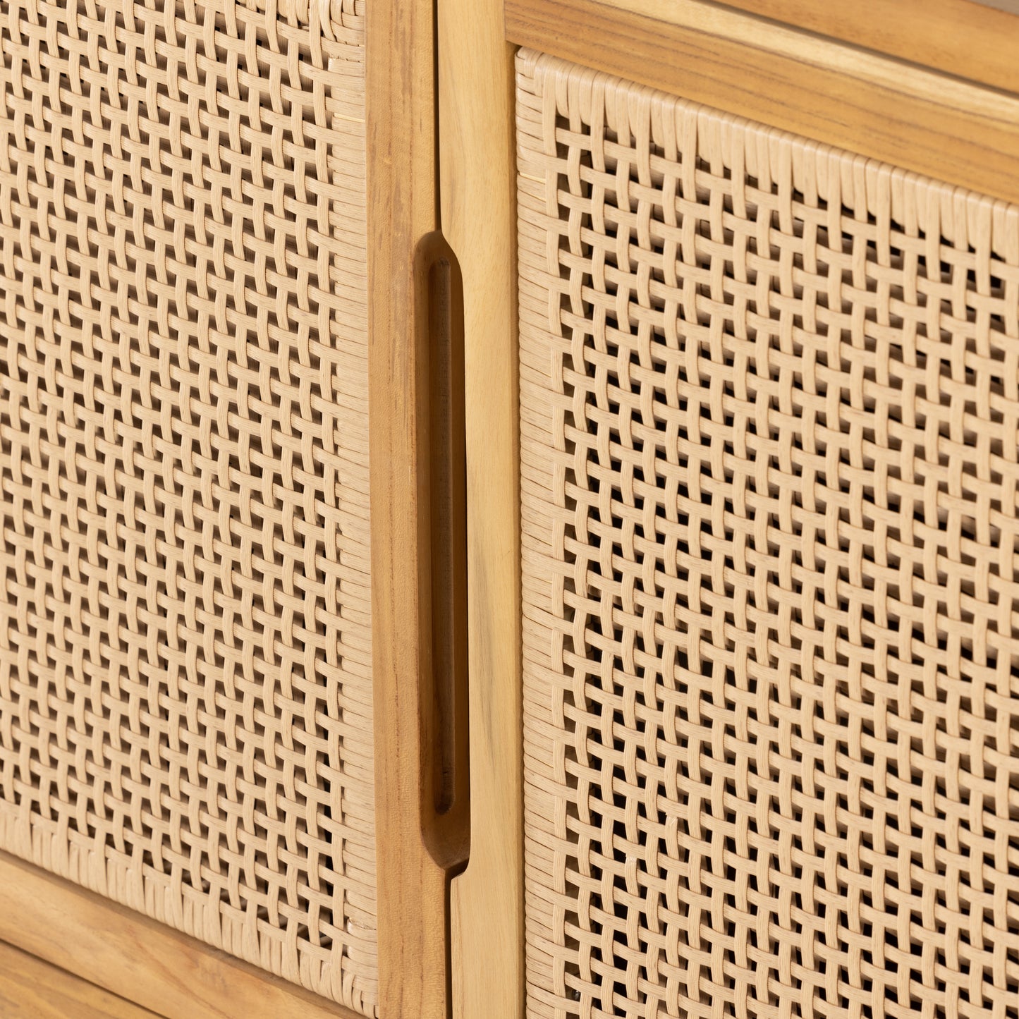 Pascal Outdoor Sideboard close up view of wicker cabinet door detail