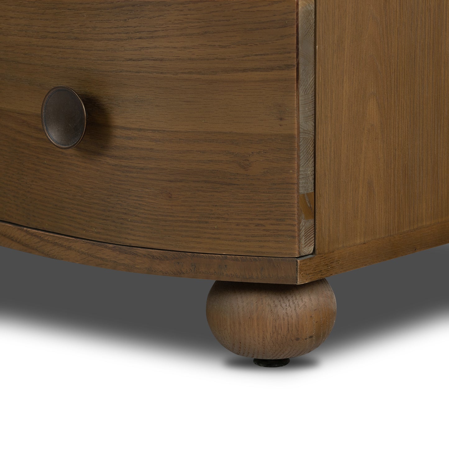 Birdie Nightstand close up view of round circle legs