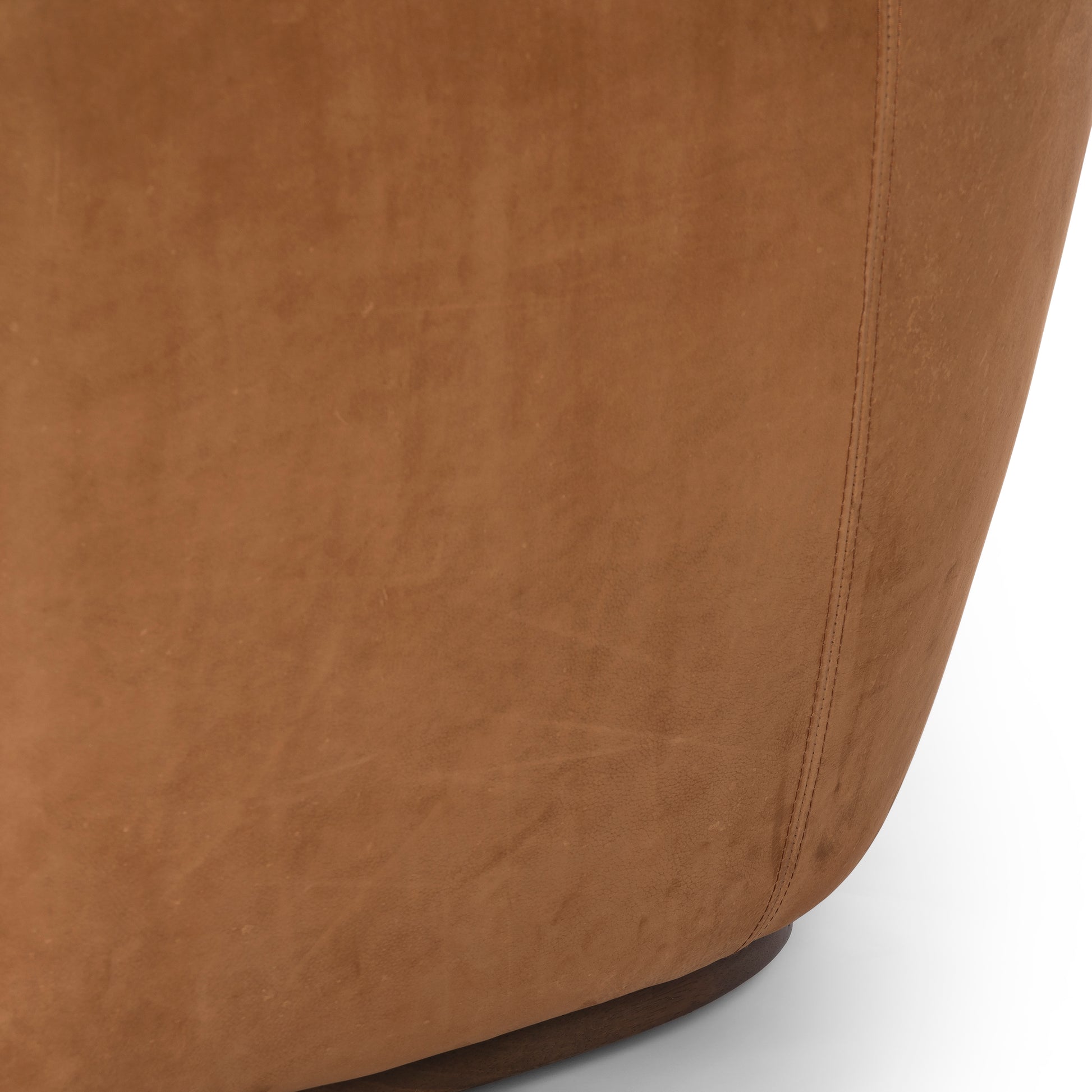 Nubuck Cognac Caesar Swivel Chair base up close