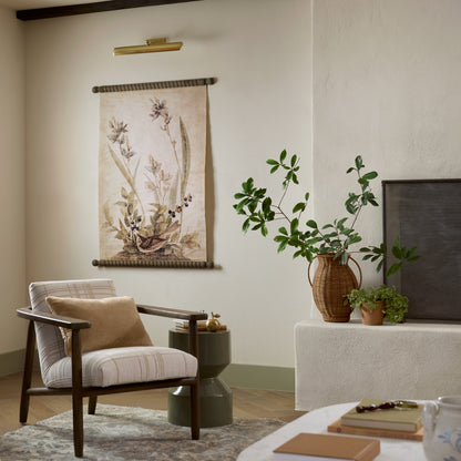 Tall Rattan Vase with Handles in a room