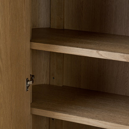 Delphine Cabinet close up view inside of cabinets with shelving
