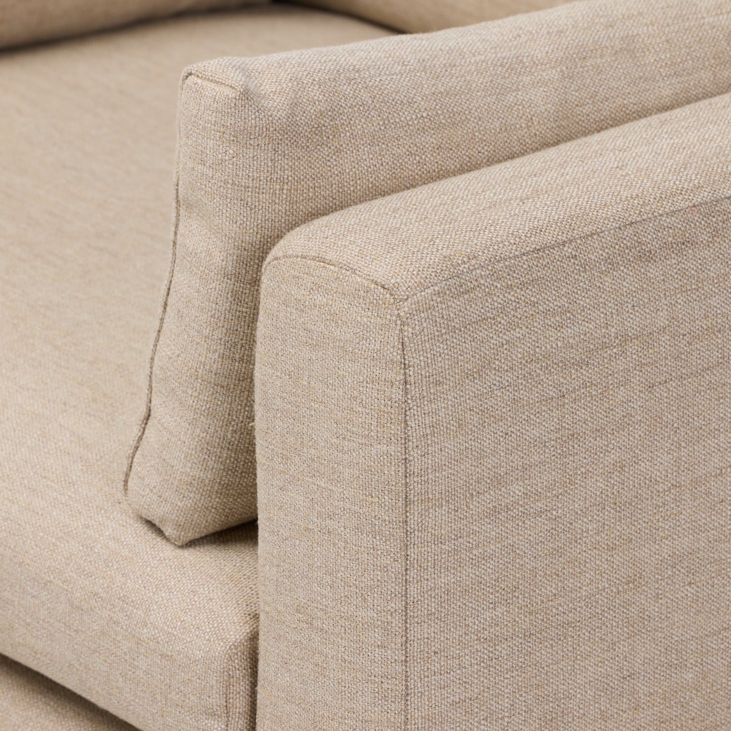 Alcala Wheat close up view of armrest with cushion