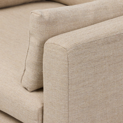 Alcala Wheat close up view of armrest with cushion