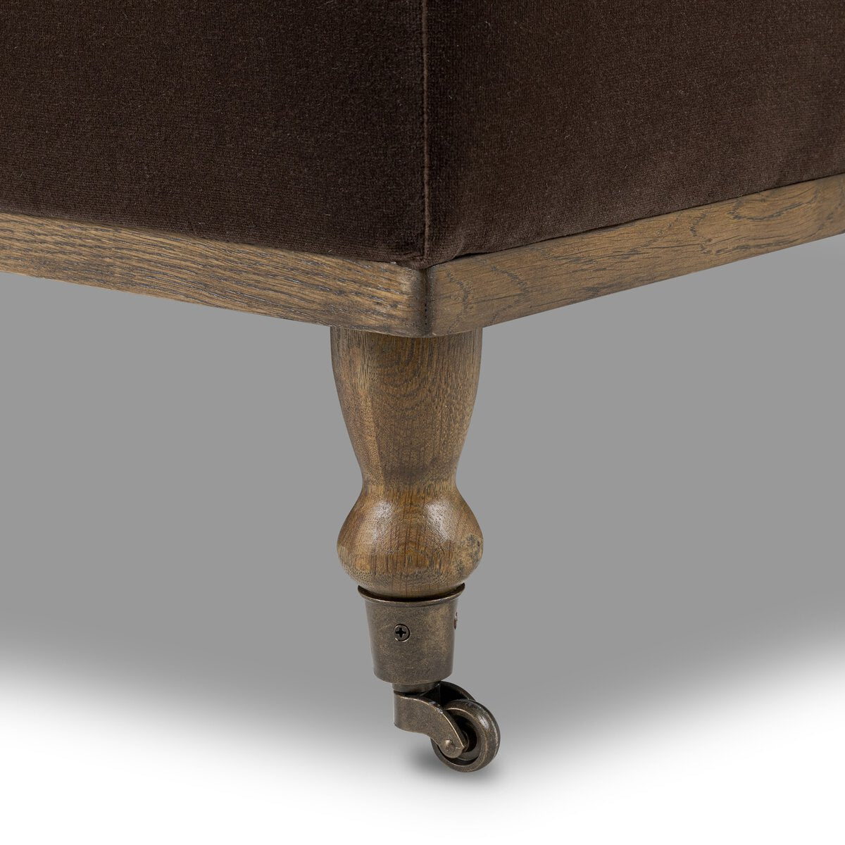 Harley Cocktail Ottoman close up rolling leg view