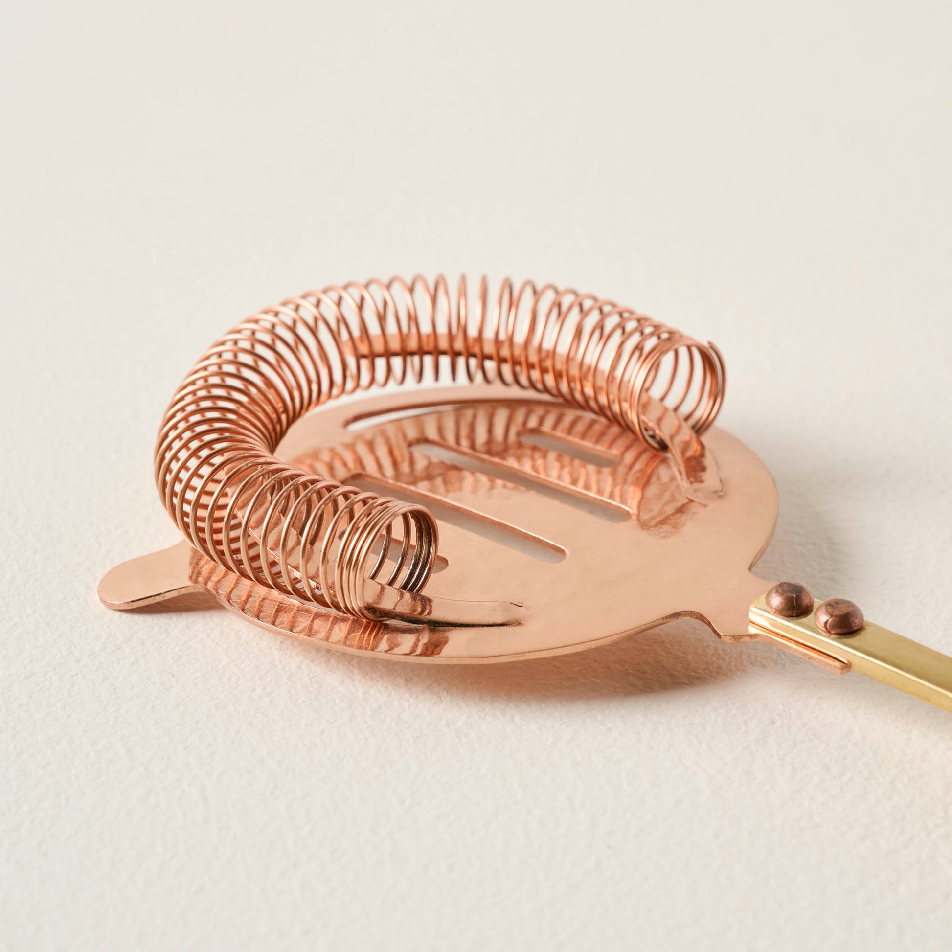 Hammered Copper and Gold Strainer up close