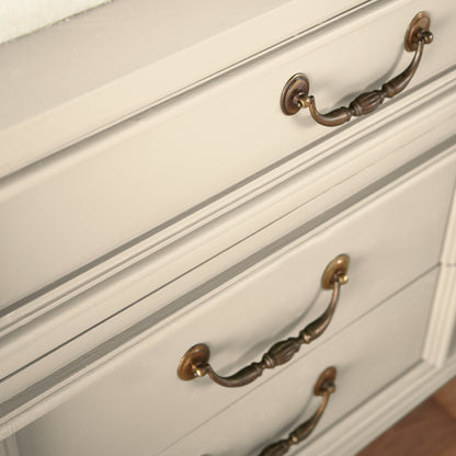 Morning Snow paint on furniture close-up with bronze handles