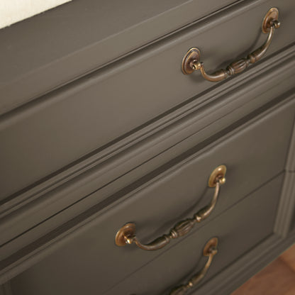 Mosswood paint featured on vintage inspired console table clese up with bronze handles
