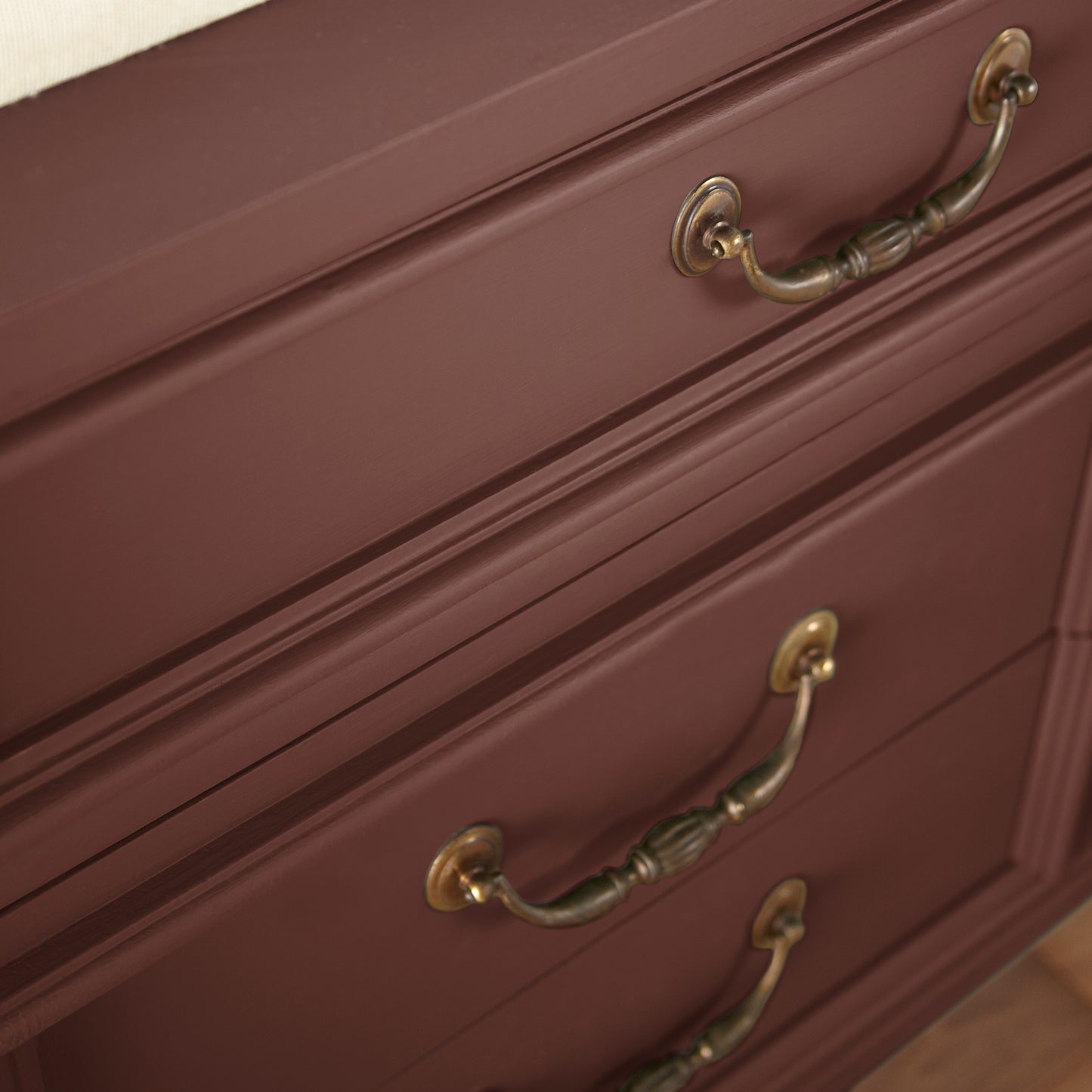 Mountain Currant paint featured on vintage inspired console table clese up with bronze handles