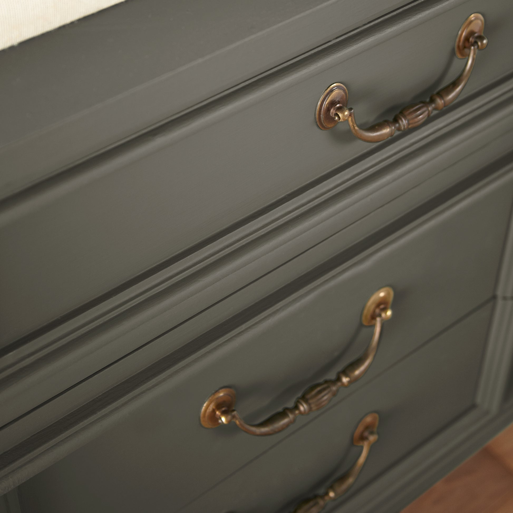 Trailhead paint featured on vintage inspired console table clese up with bronze handles