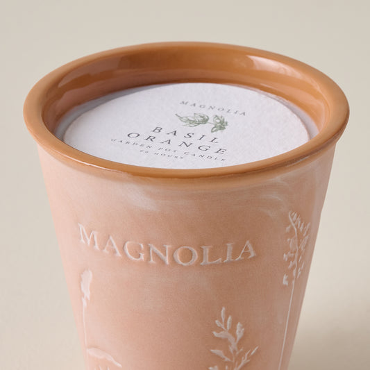 Magnolia Basil Orange Garden Pot Candle up close