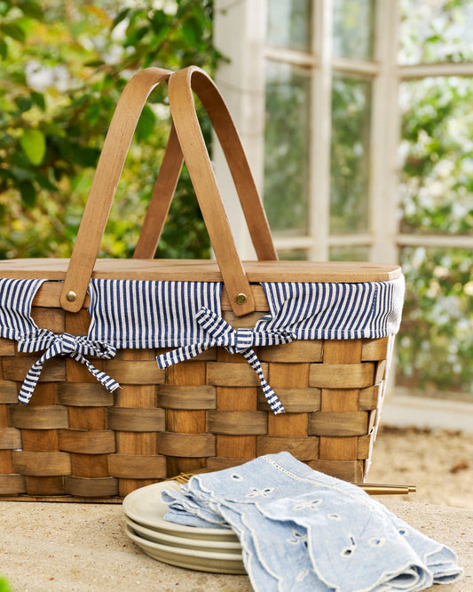 Kansas Handwoven Picnic Basket shown outside