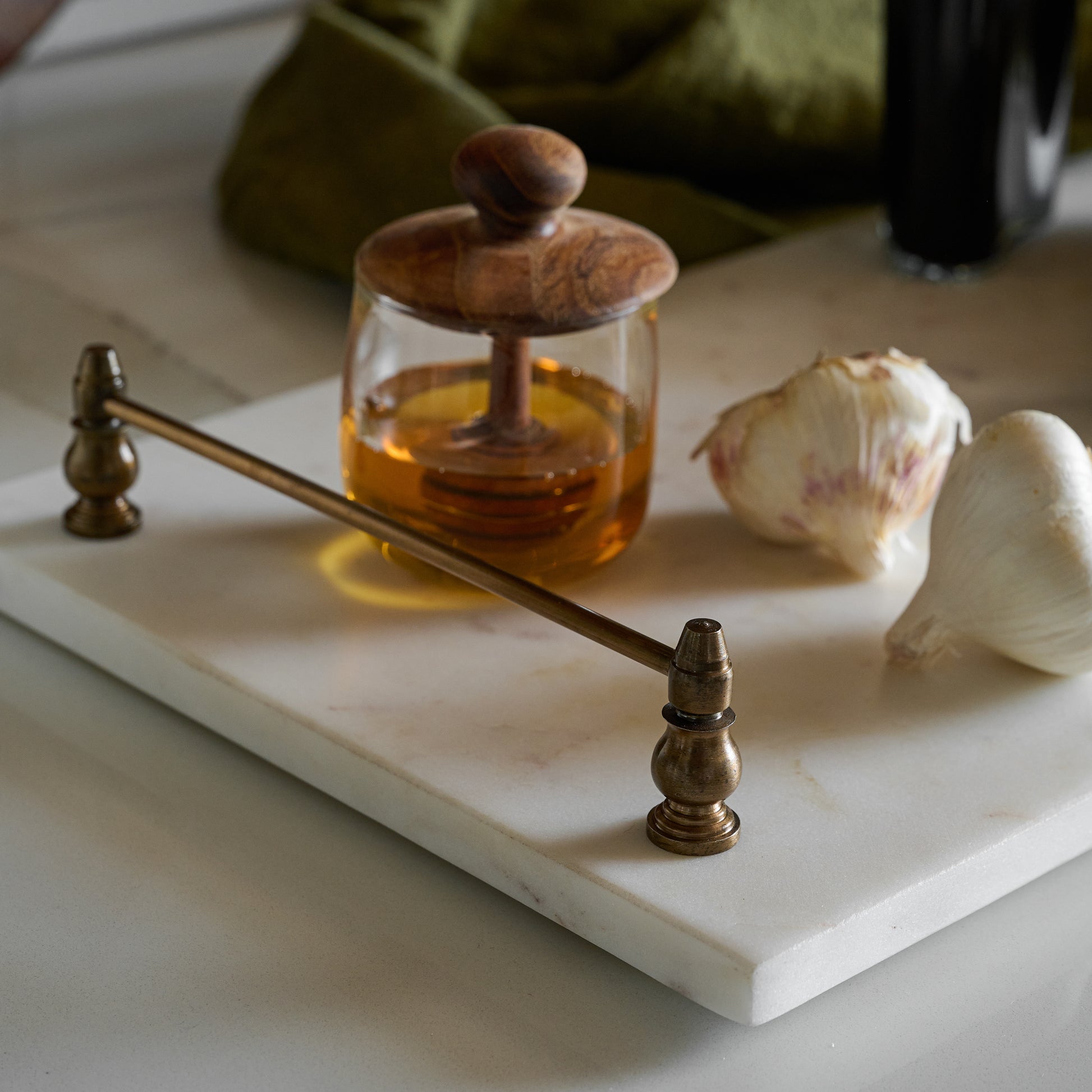 Honey Dipper Lidded Jar on a marble serving board