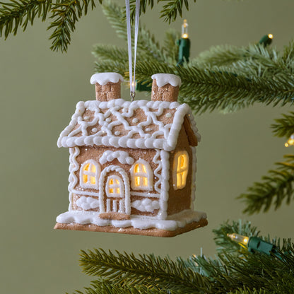 Cottage Gingerbread House Ornament shown on tree