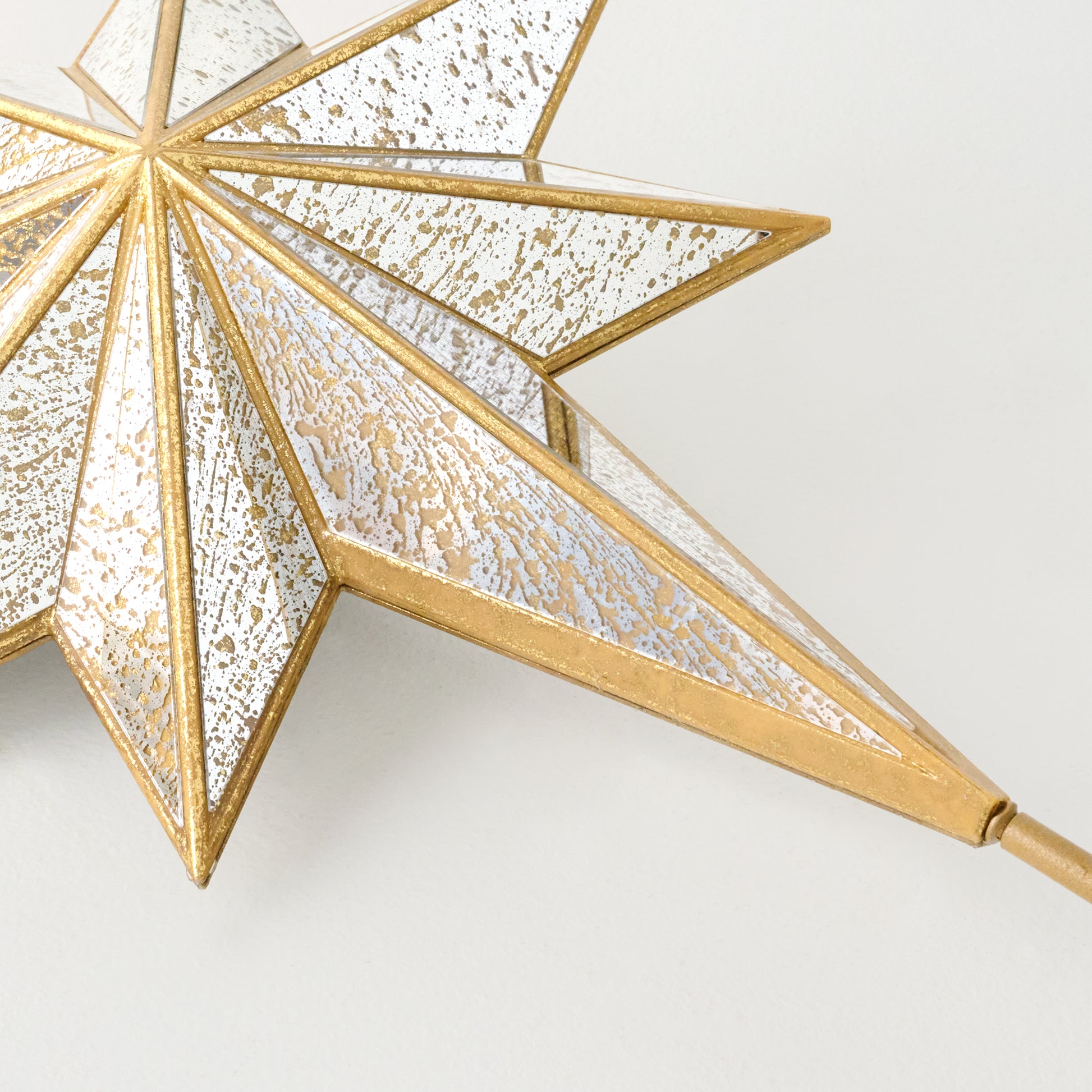 Gold Mercury Star Tree Topper up close