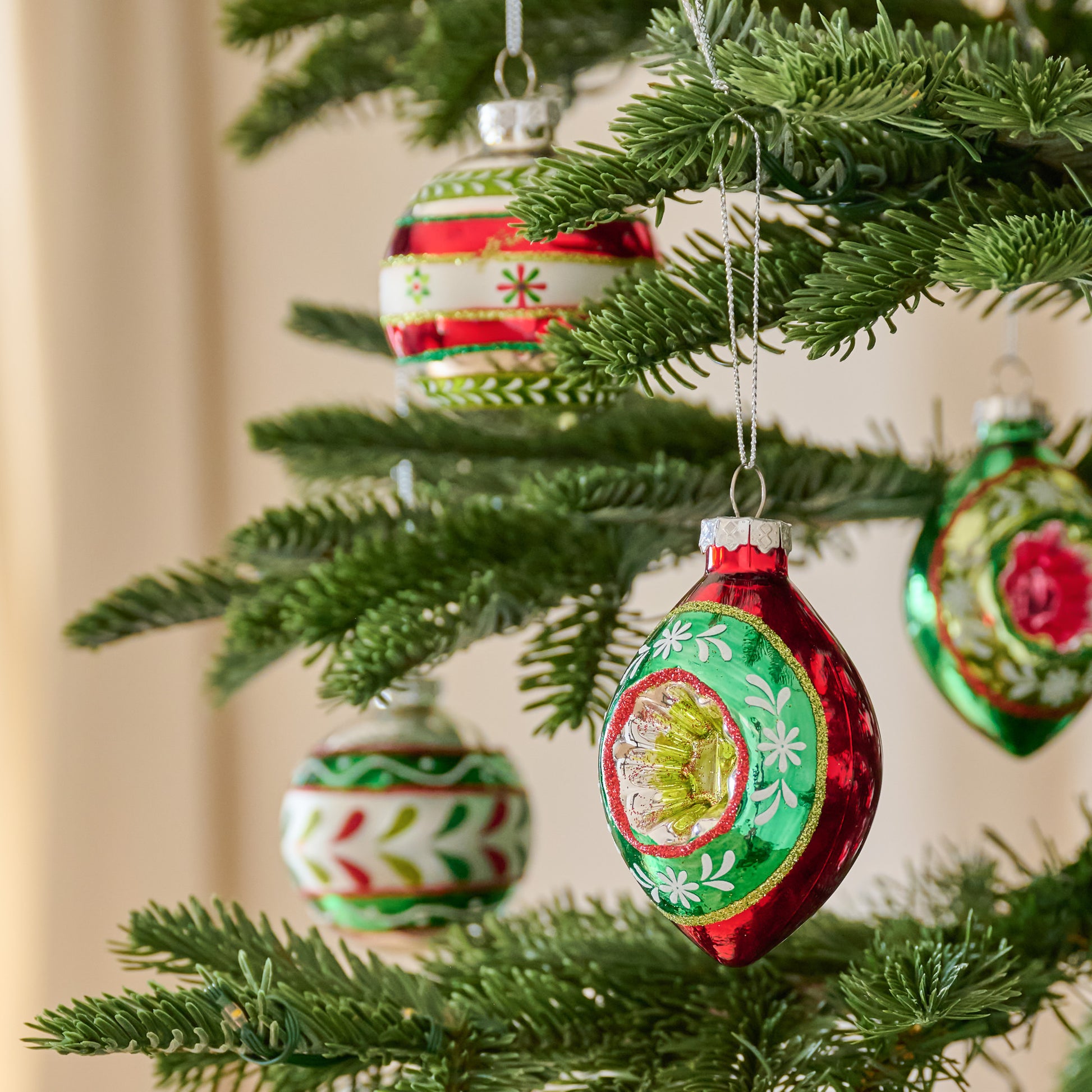 Vintage-Inspired Colorful Ornament Set shown on tree