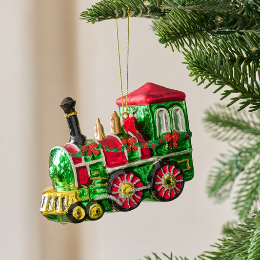 Vintage-Inspired Blown Glass Train Ornament shown on tree