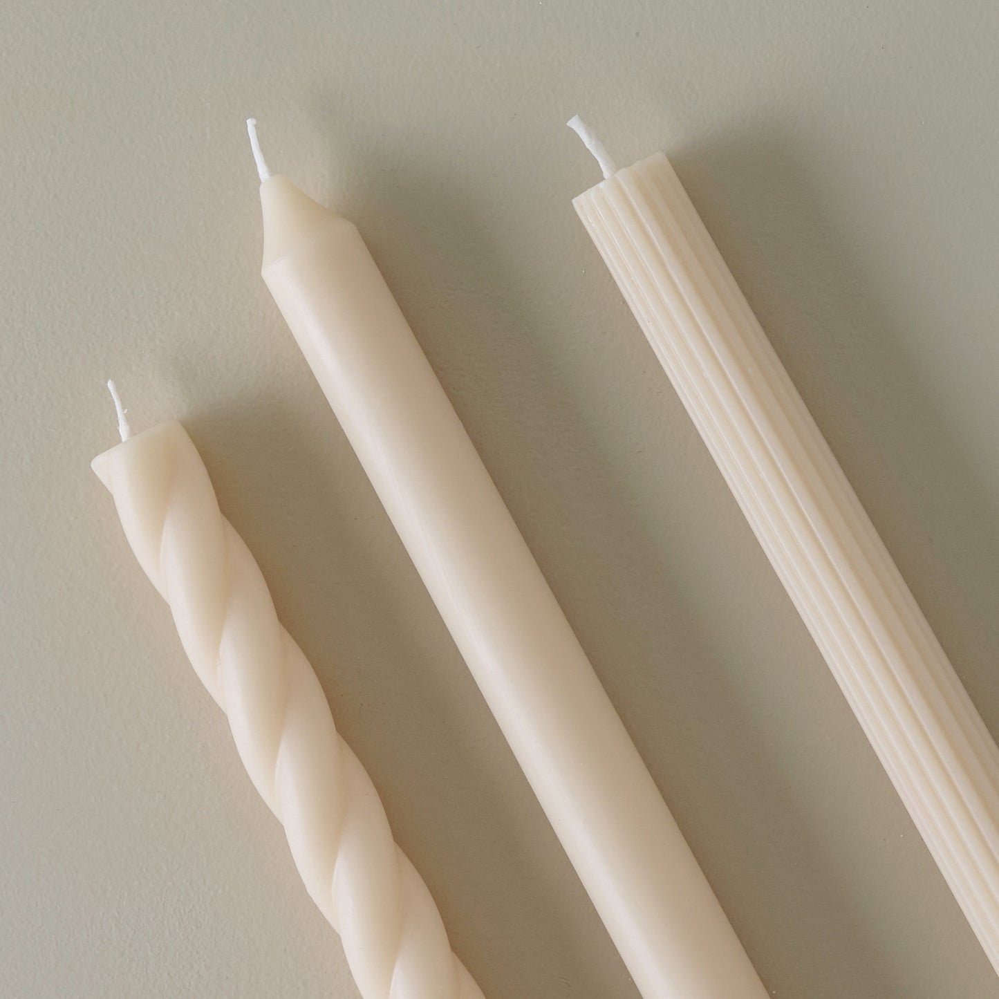 Assorted Cream Taper Candle Set up close