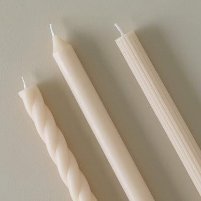Assorted Cream Taper Candle Set up close