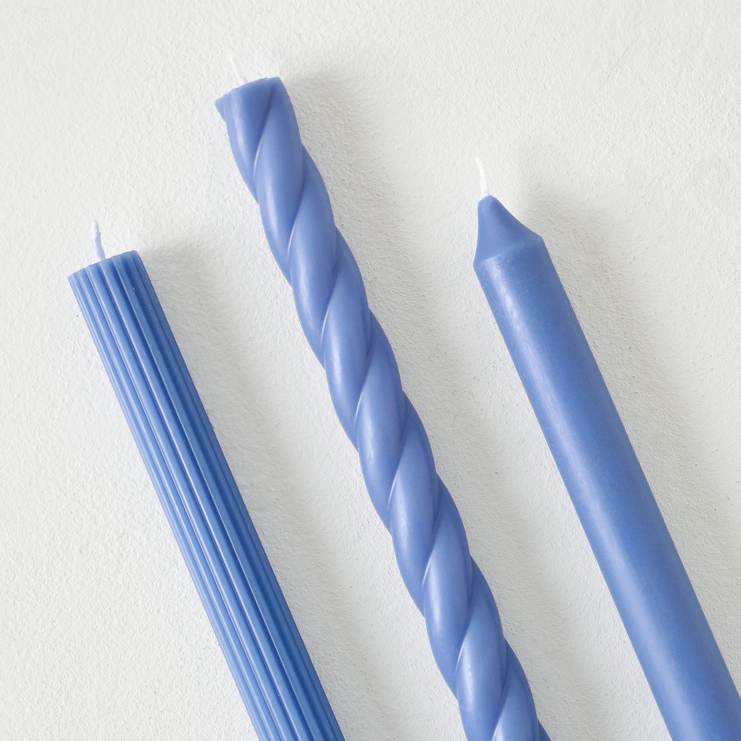 Assorted Blue Taper Candle Set up close