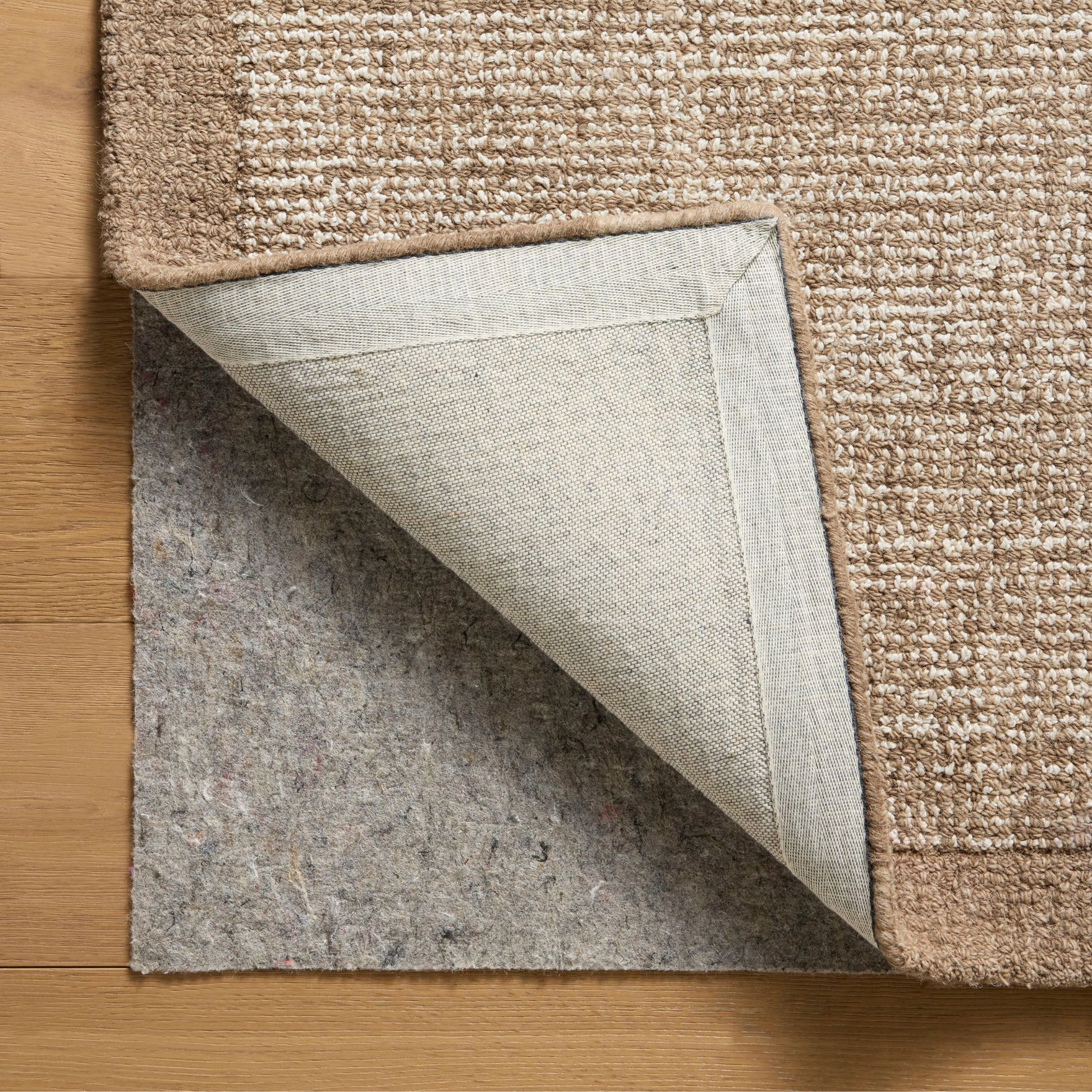 Henley Ivory Brown Rug corner shown flipped