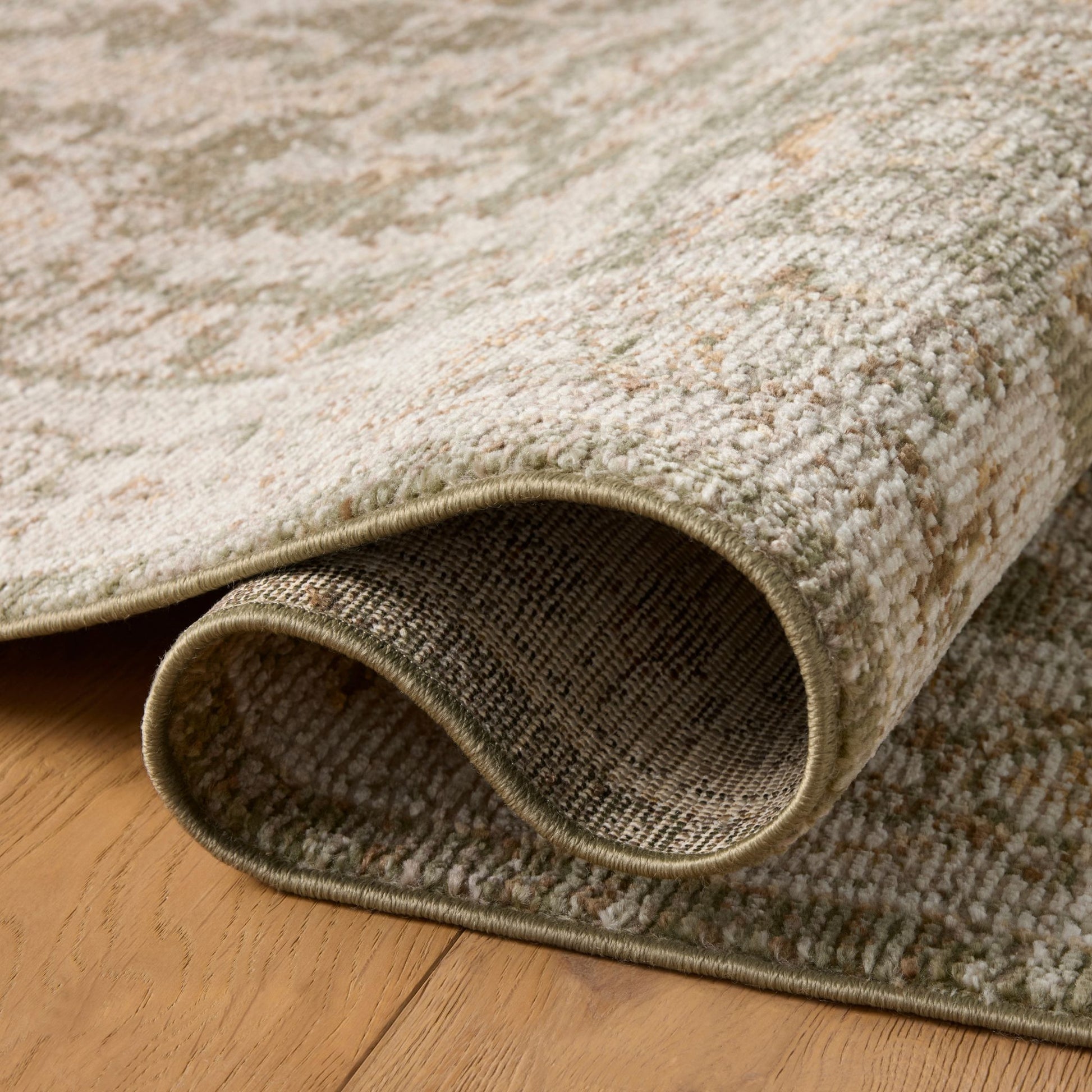Pace Forrest Natural Rug shown rolled/folded