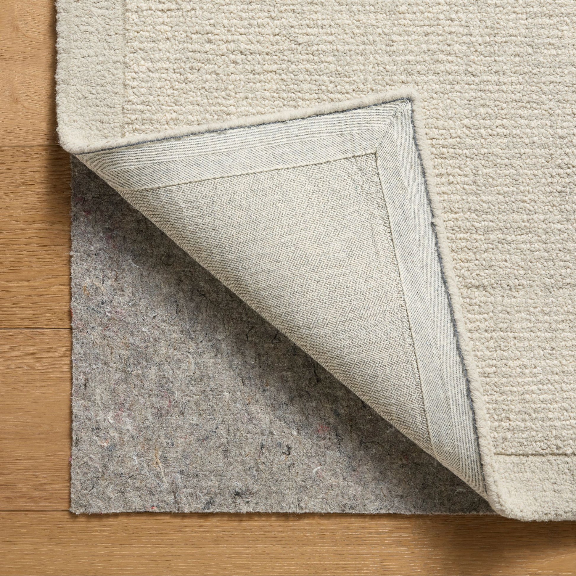 Henley Ivory Silver Rug corner shown flipped