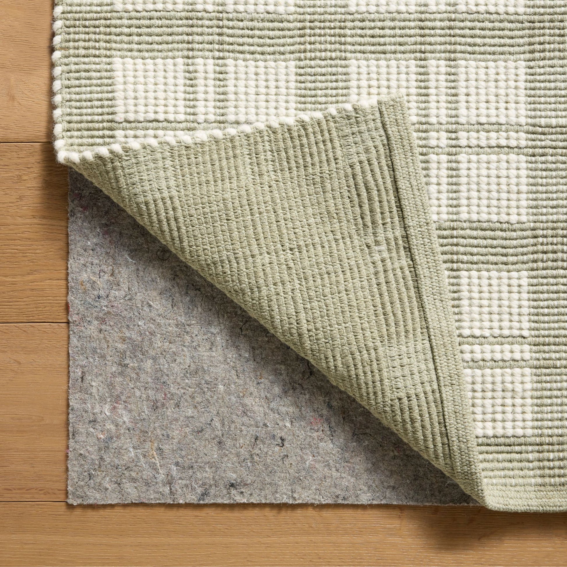 Ryder Sage Ivory  Rug corner shown flipped