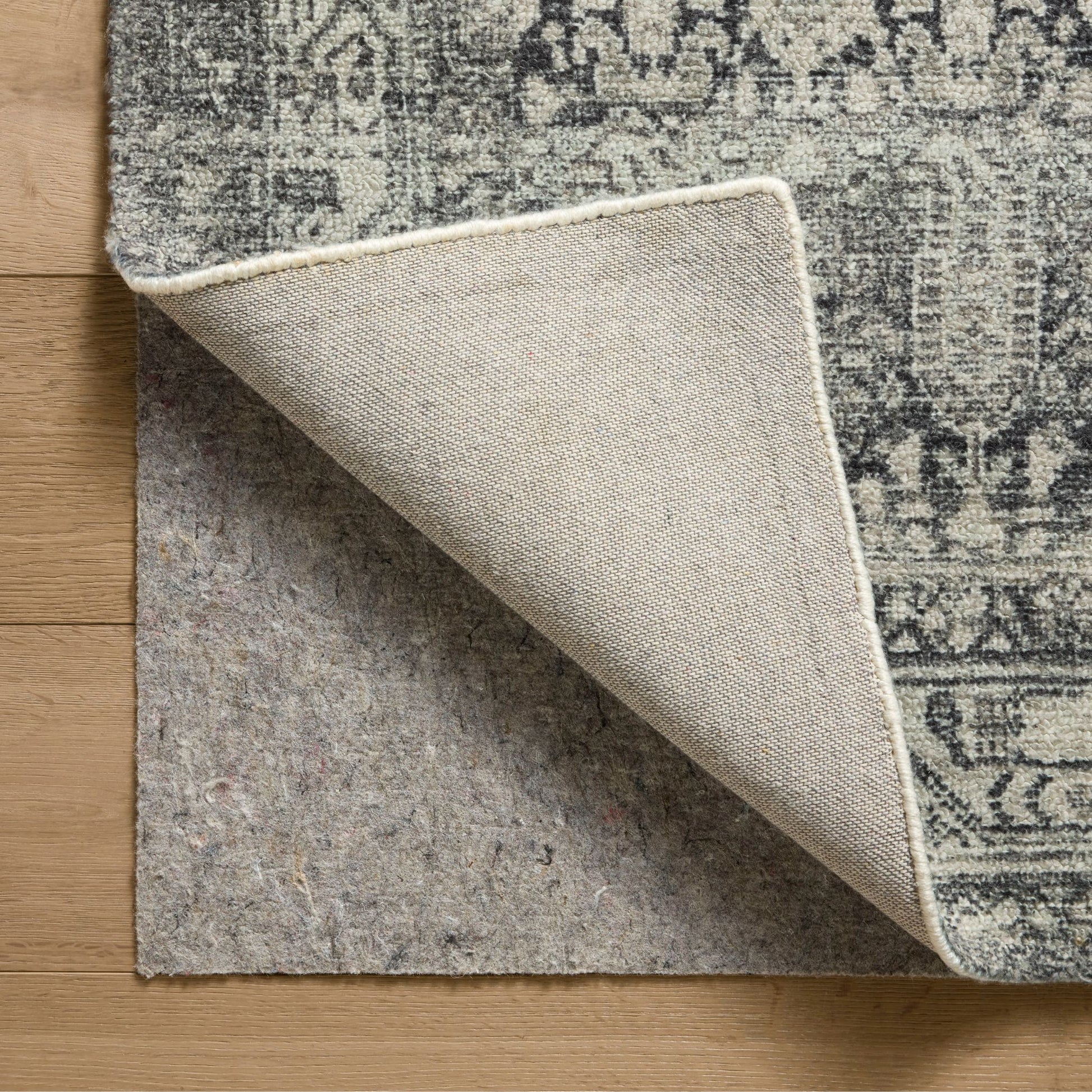 Wimberly Granite Cream Rug corner shown flipped