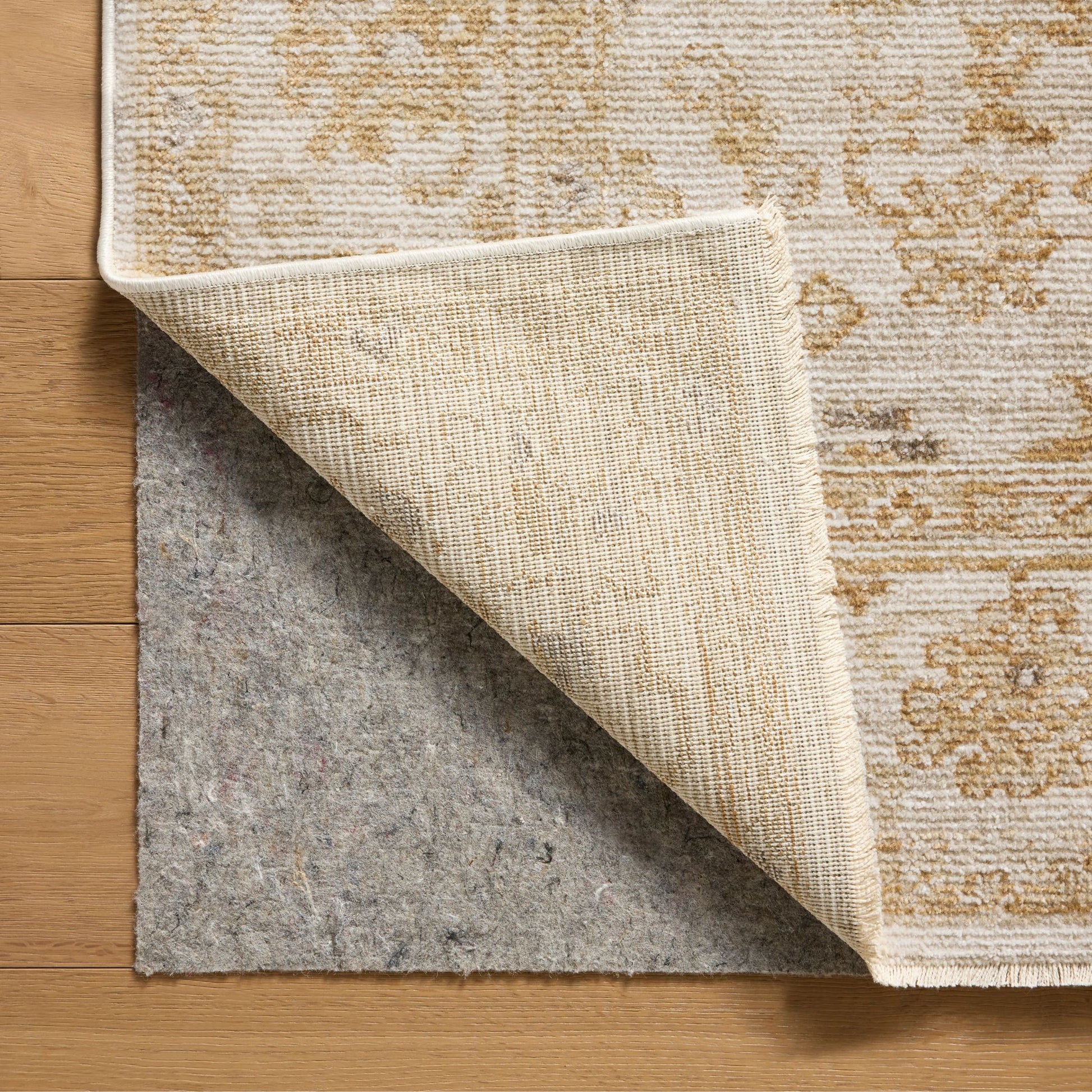 Pace Natural Gold Rug corner shown flipped up