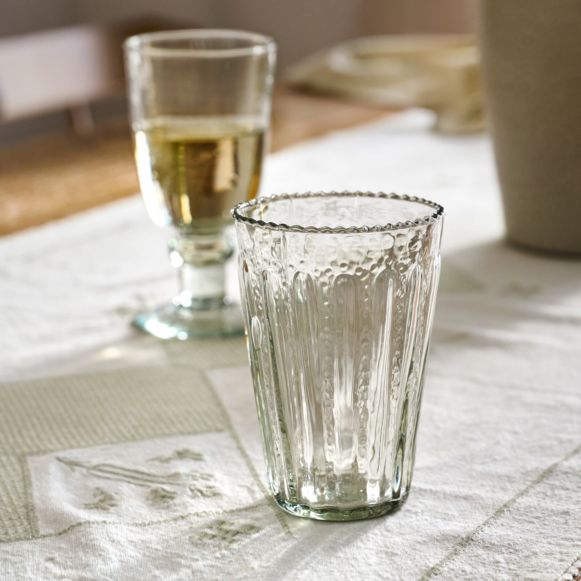 Large Elizabeth Bottle Cut Glass Tumbler on a table