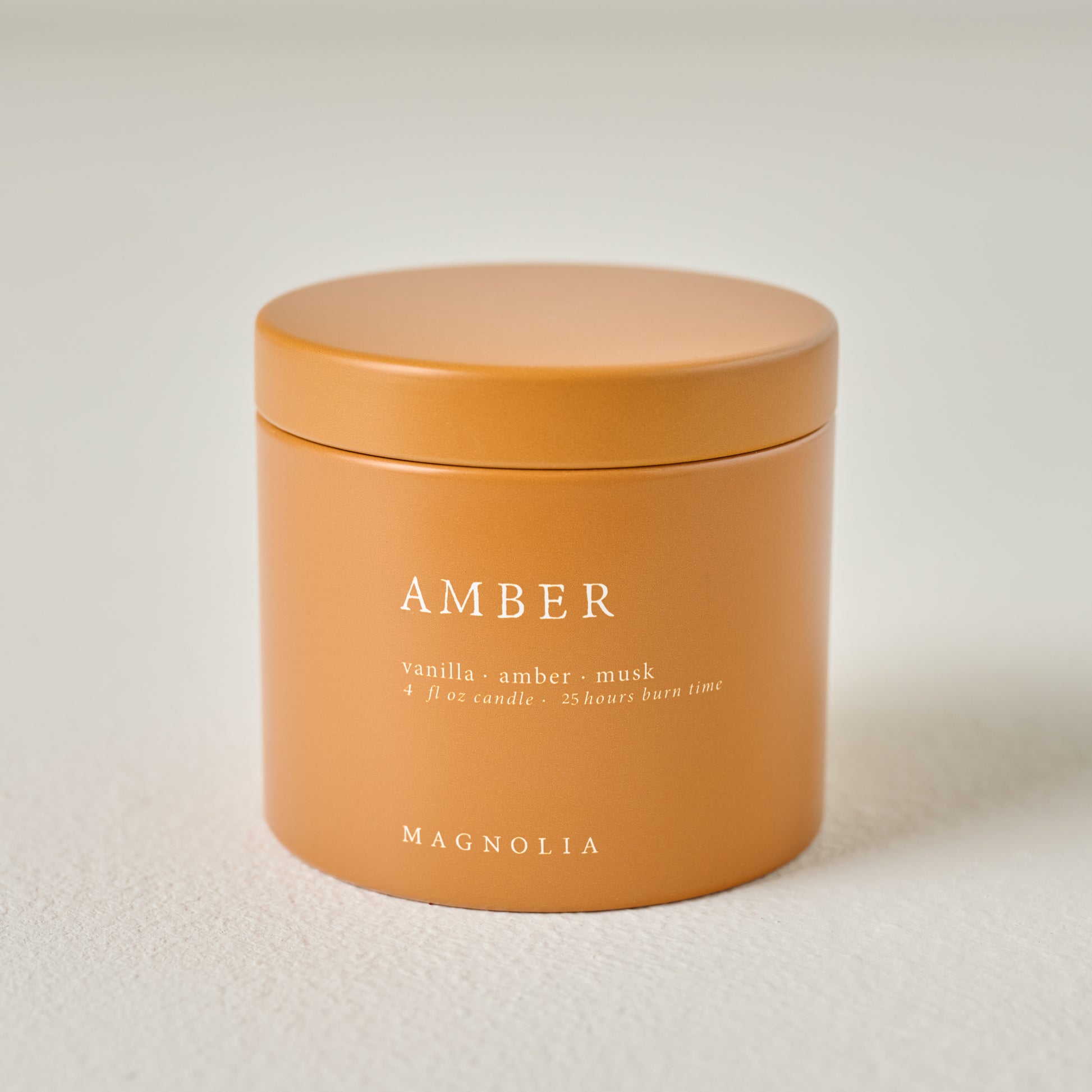 Magnolia Amber Candle Tin 