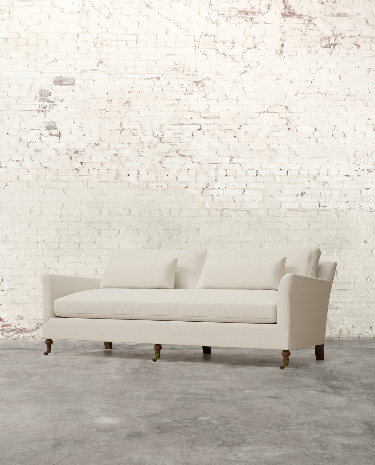 Alfie 87" Bench Sofa with Brass Casters