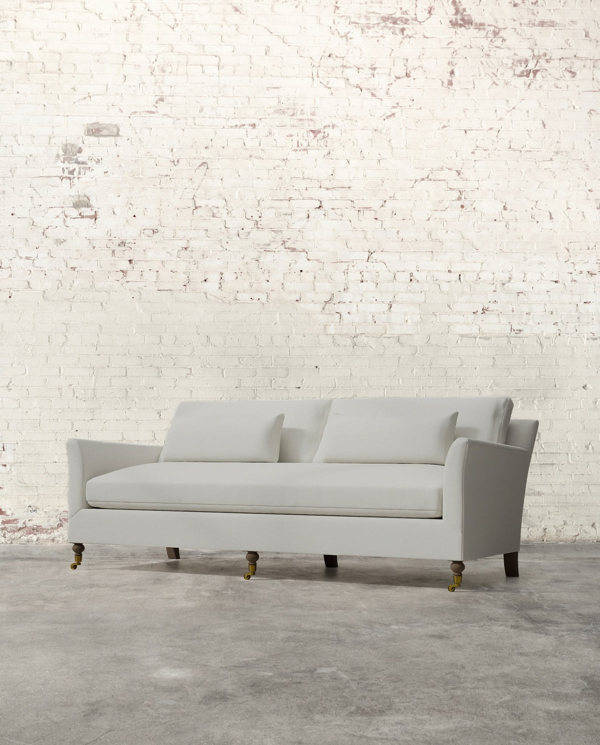 Alfie 87" Bench Sofa with Brass Casters