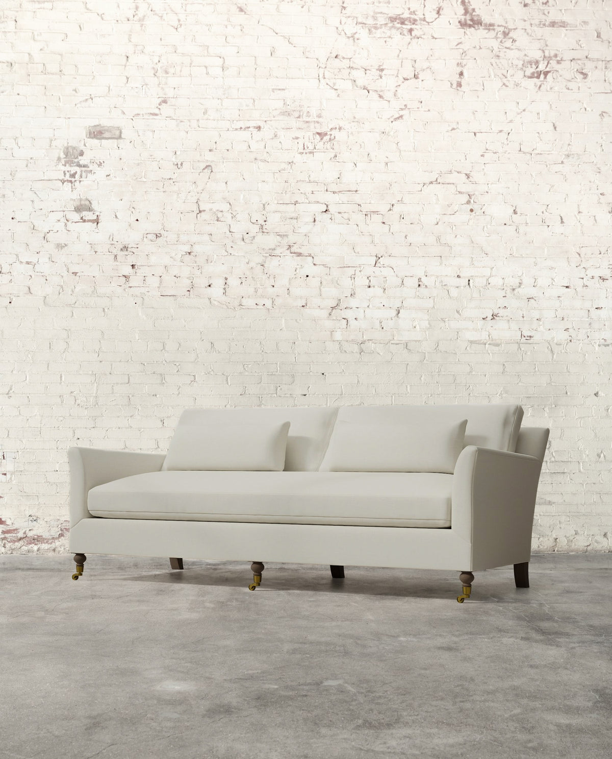 Alfie 87" Bench Sofa with Brass Casters