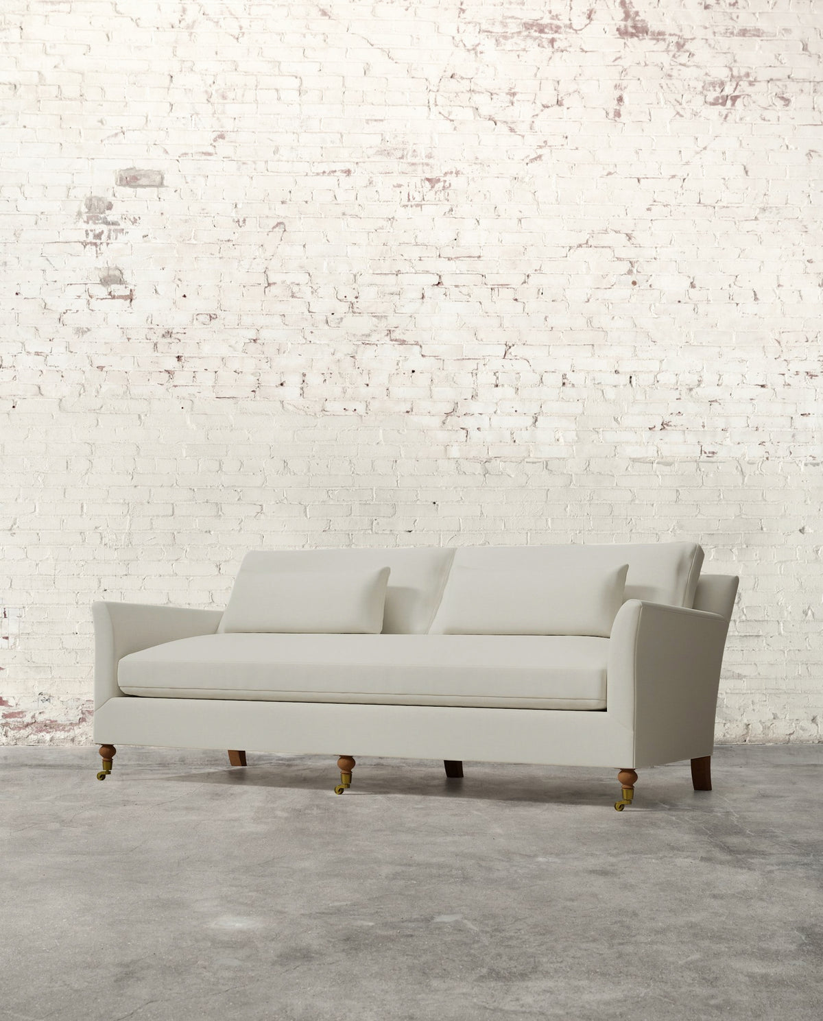 Alfie 87" Bench Sofa with Brass Casters