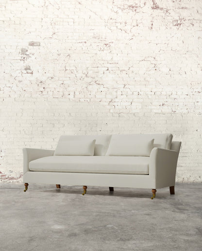 Alfie 87" Bench Sofa with Brass Casters